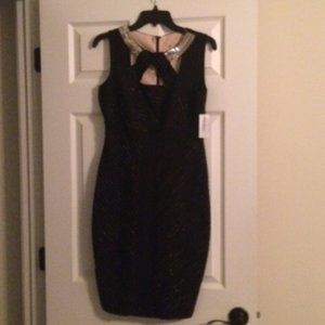 Black shimmer form fitting dress tags on brand new